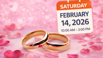 gold rings on pink heart background with flower petals with sign that reads Saturday, February 14, 2026 10:00 AM-3:00 PM