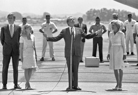 Richard Nixon, surrounded by family and military personnel, speaks on the tarmac at MCAS El Toro, Aug 9, 1974.